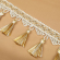 Бахрома для штор с кисточками арт.6152-0327 цв.6343 шир.100мм цв.молочный+золото уп.10м
