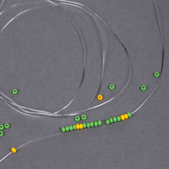 Нить силиконовая арт.ТВ 0215-1012 0,6мм цв.прозрачный рул.30м