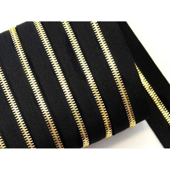 Молния рулонная металл №5СТ золото цв.D580 черный уп.10м Молния рулонная металл №5СТ золото цв.D580 черный уп.10м