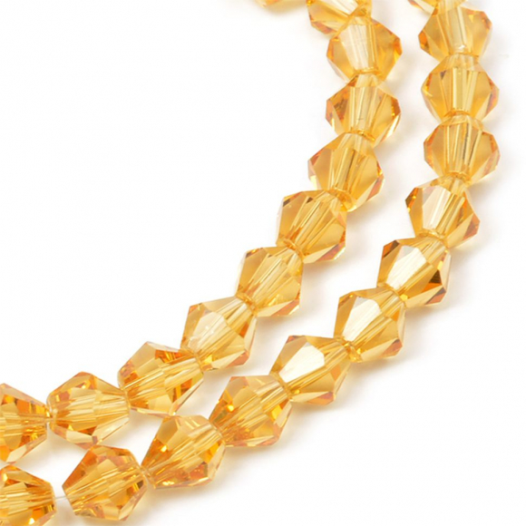 Бусины граненые Биконус(стекло) на нитях арт.TBY-K-1 6х6мм отвер.1,5мм цв.33 св.желтый уп.1х50 бусин Бусины граненые Биконус(стекло) на нитях арт.TBY-K-1 6х6мм отвер.1,5мм цв.33 св.желтый уп.1х50 бусин