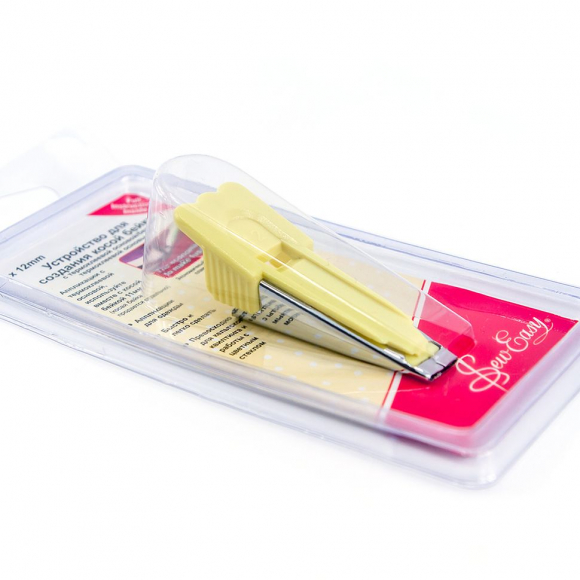 Устройство для изготовления косой бейки Устройство для изготовления косой бейки