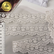 Кружево гипюр KRUZHEVO арт.TR.SUN.09 шир.32мм цв.02 молочный уп.9м