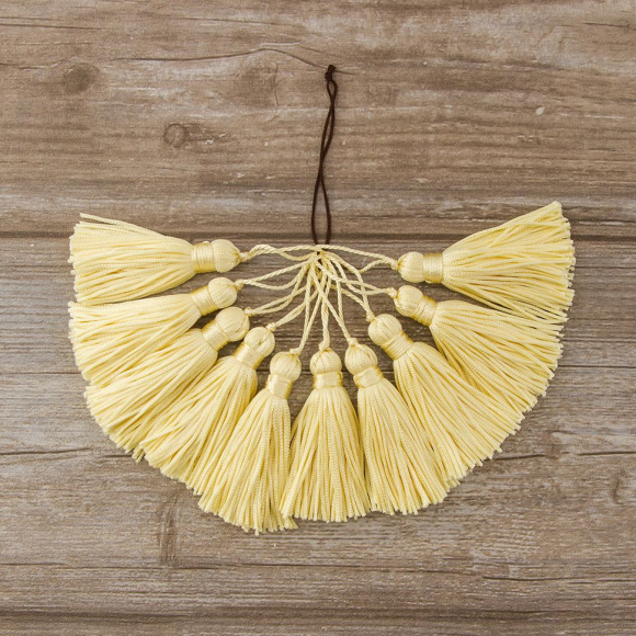 Кисть декоративная на шнуре, длина 70 мм, цвет кремовый