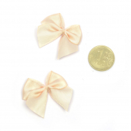 Бантики пришивные арт.MJ.RF.072.21 1,5см цв.21 бежевый уп.100шт Бантики пришивные арт.MJ.RF.072.21 1,5см цв.21 бежевый уп.100шт