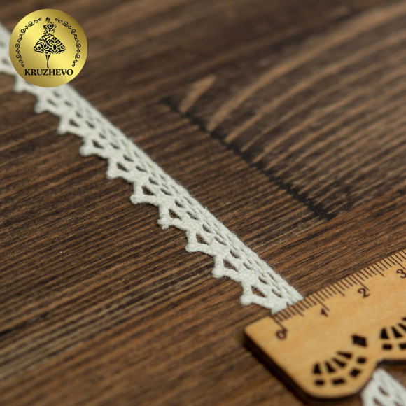 Тесьма вязаная KRUZHEVO 10мм TBY-5036.28 цв.28 молочный уп.10м