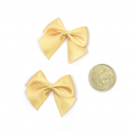 Бантики пришивные арт.MJ.RF.072.04 1,5см цв.04 бежевый песочный уп.100шт Бантики пришивные арт.MJ.RF.072.04 1,5см цв.04 бежевый песочный уп.100шт