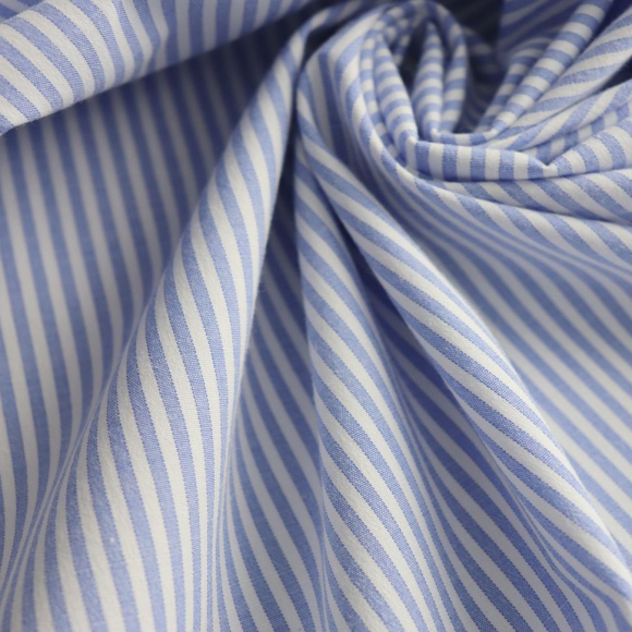 Ткань рубашечная 125 г/м? 60% полиэстер, 37% хлопок, 3% спандекс шир.150 см арт.Р.14785.01 цв.01 голубой уп.25м